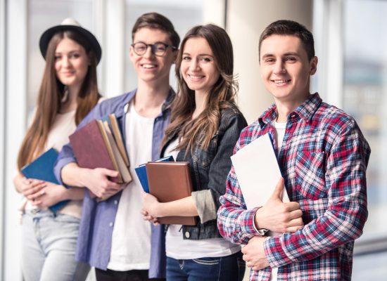 group-happy-young-students-university